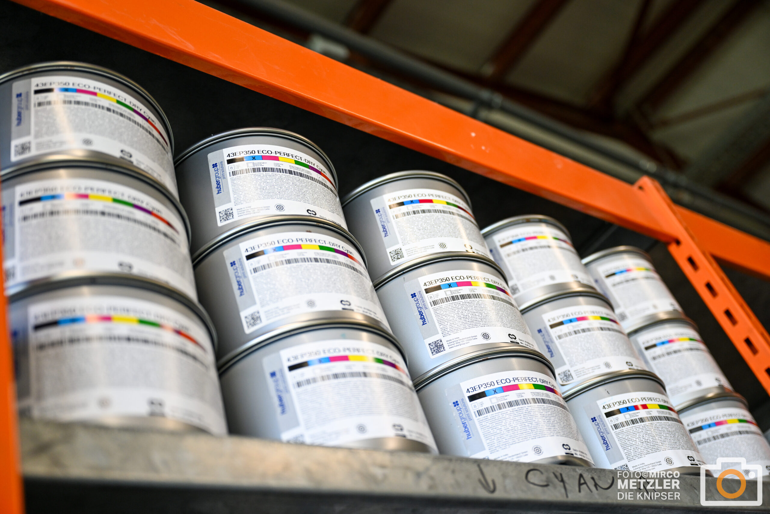 Two people discussing and choosing color palettes for interior design projects.