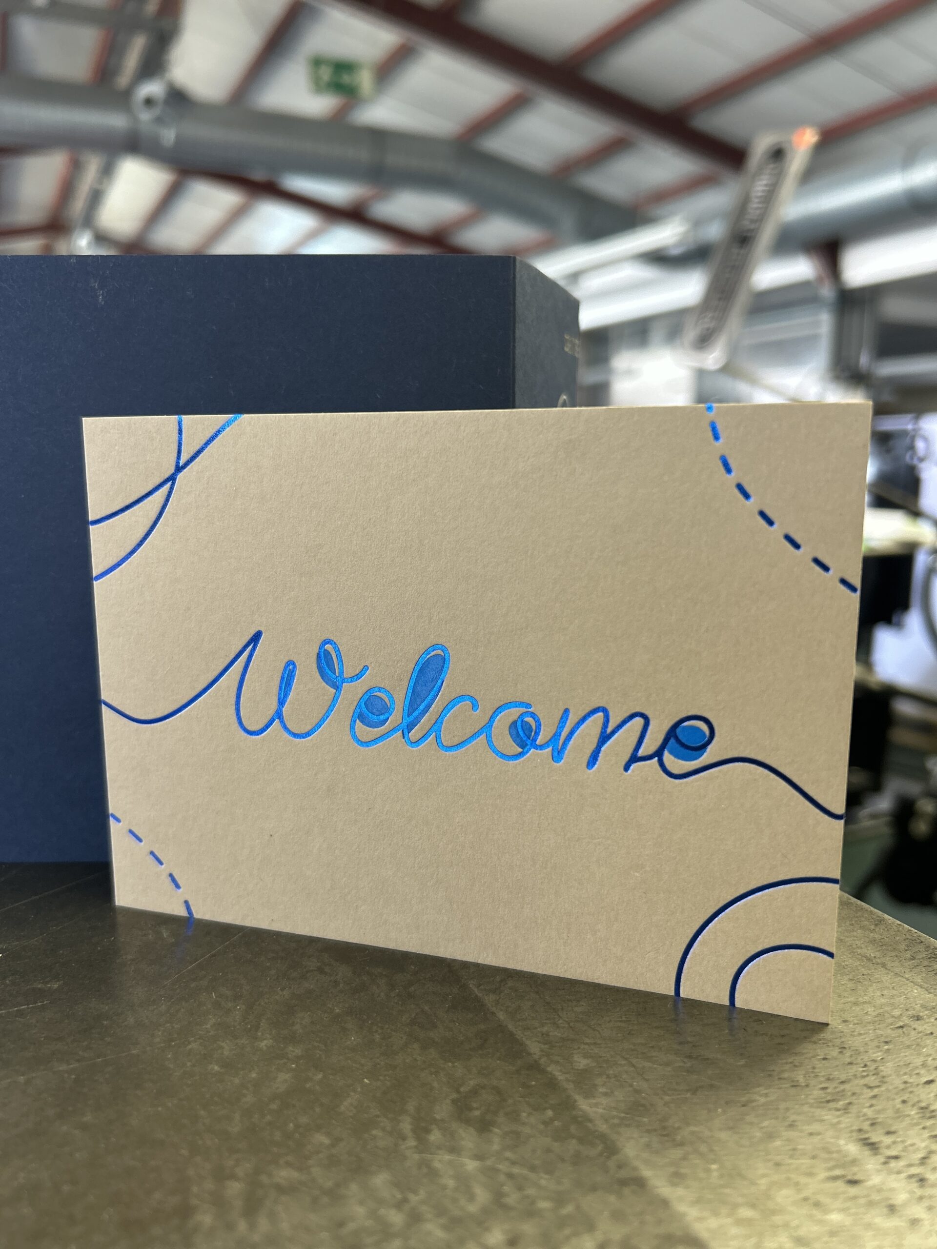 Two people discussing and choosing color palettes for interior design projects.